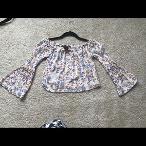 Off the shoulder floral printed crop top.